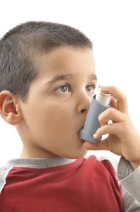 Boy-with-asthma-inaler_iStock-199x300