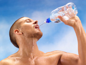 man drinking water