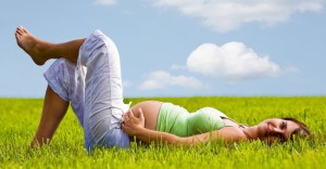 pregnant_woman_meadow_summer_laying_nature_0